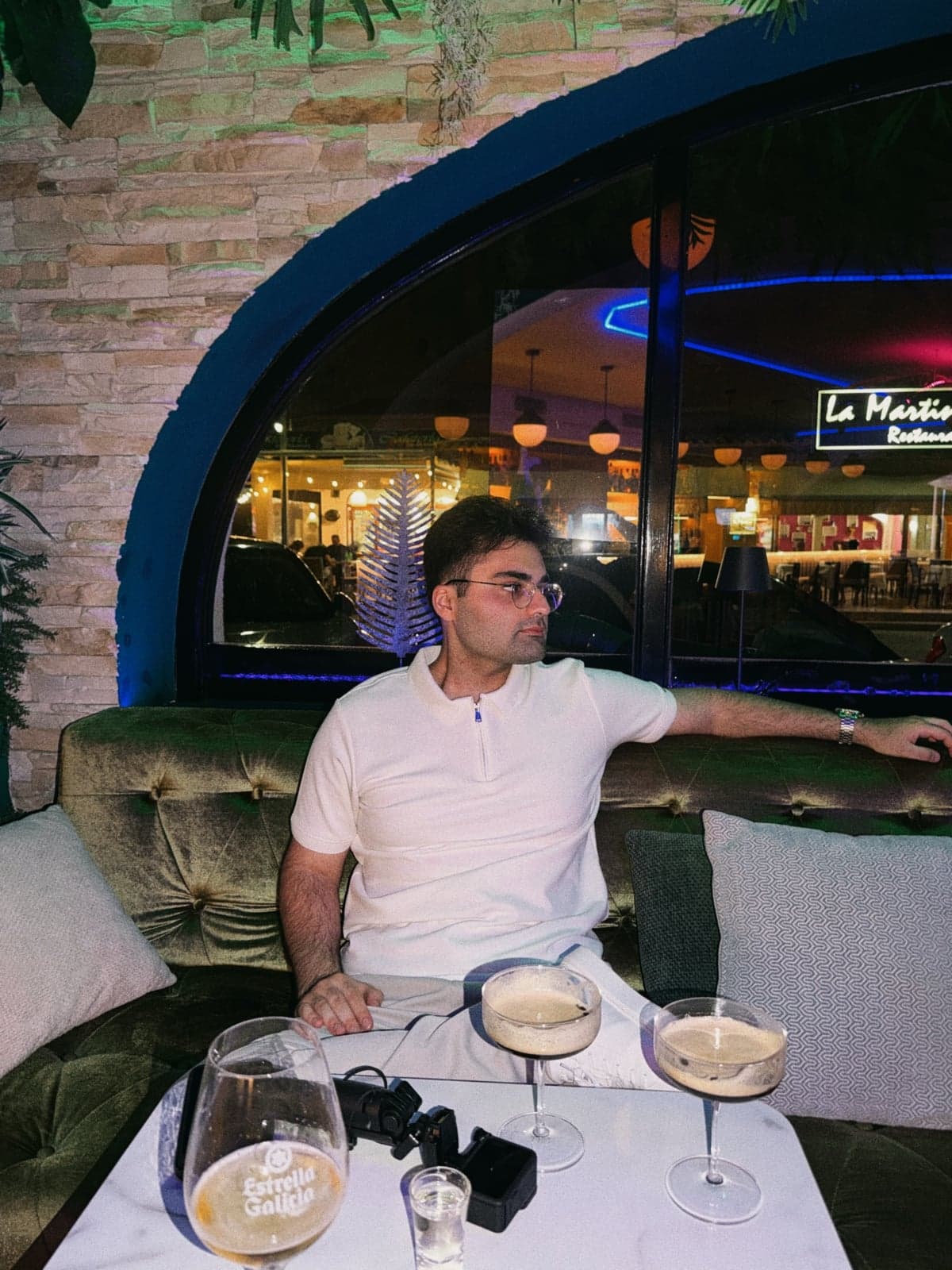 Relaxing on a lounge sofa with drinks in the evening